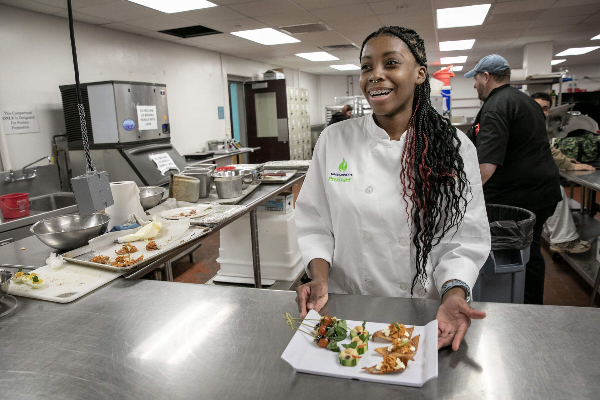 Jahsmine Son in the kitchen at Cambridge Rindge and Latin School. She will join the inaugural three-year degree class at Johnson and Wales next fall. (Robin Lubbock/WBUR)