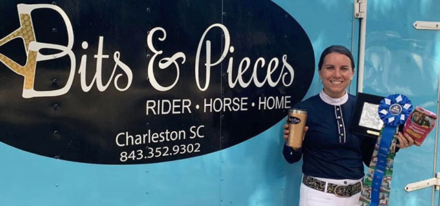 A photo of JWU alumni Tierney Boyd '11 posing in front of her business logo