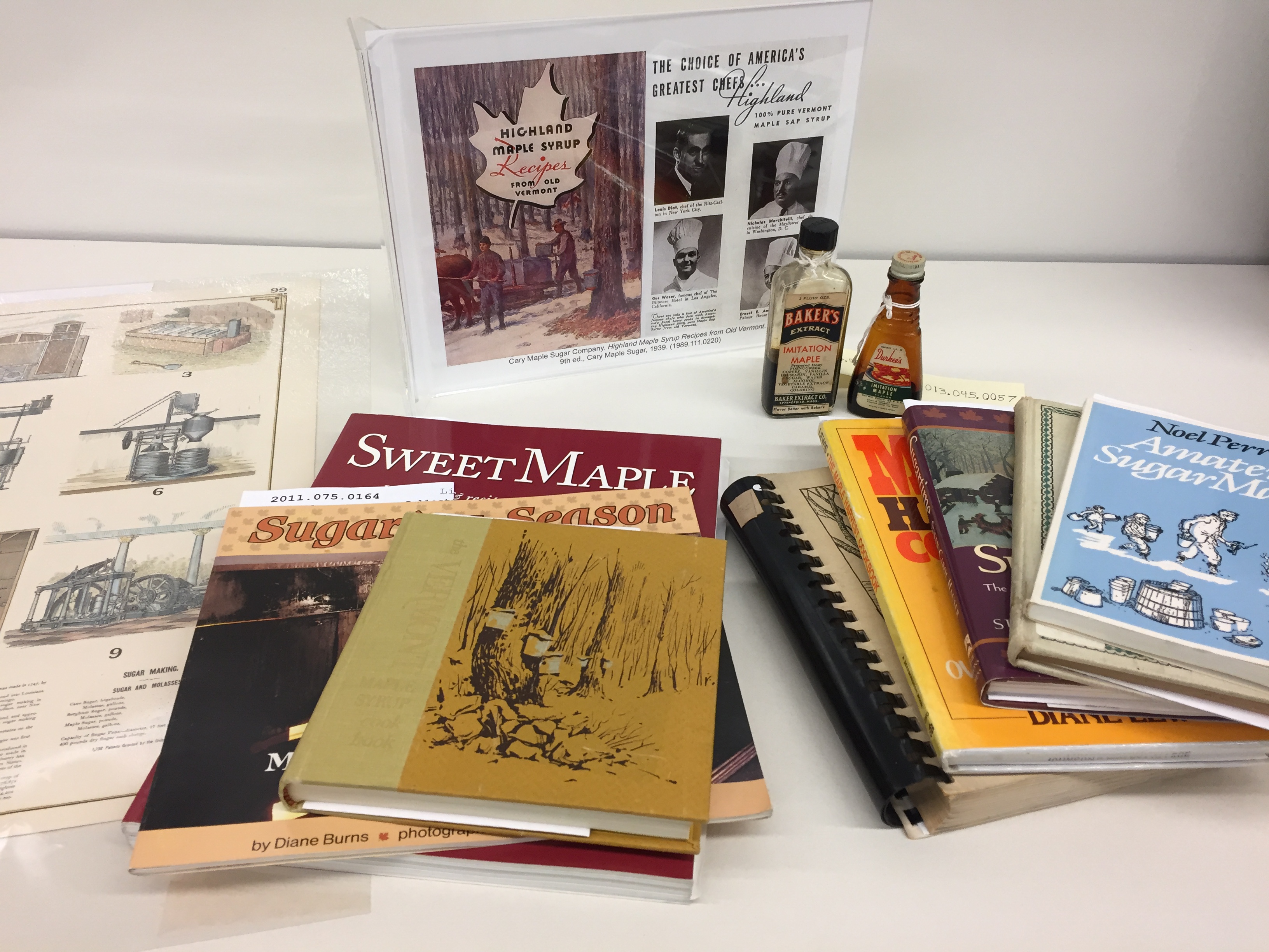 Display of archival cookbooks related to maple sugar