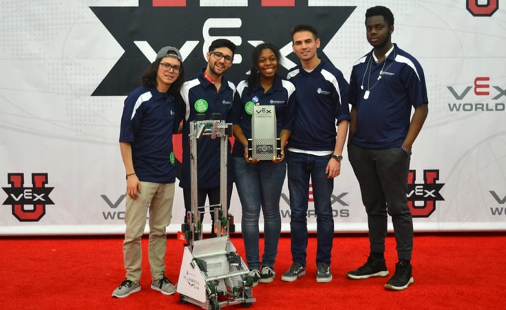 Edgar Falcón, Manuel Rosado, Bronique Smith, Jossean Rivera and Edafe Efosa at the 2018 Vex Robotics World Championship Edgar Falcón, Manuel Rosado, Bronique Smith, Jossean Rivera and Edafe Efosa pose for a photo after winning the Create Award.