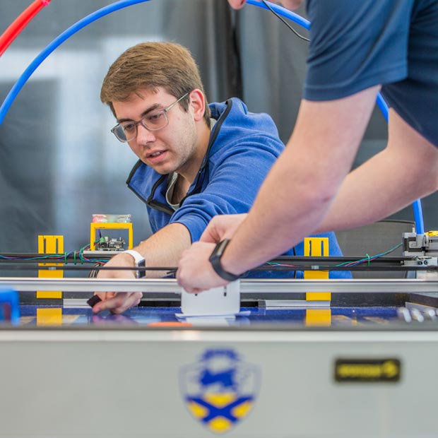 In 2018, JWU students built a robotic air hockey game