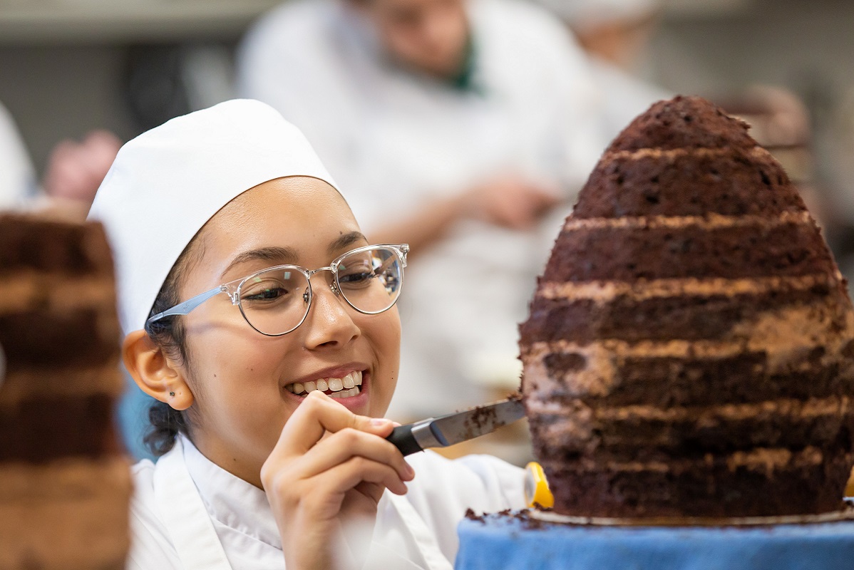 culinary student baking chocolate cake