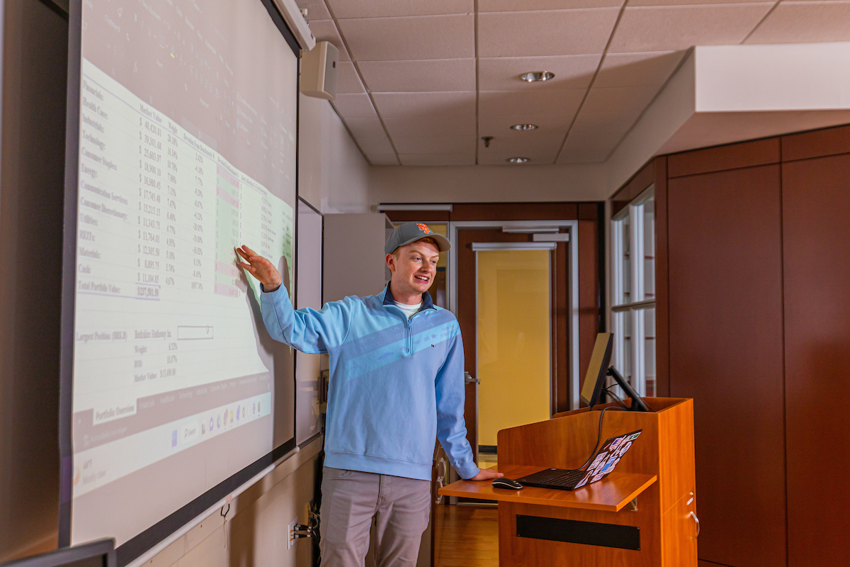 student giving financial presentation