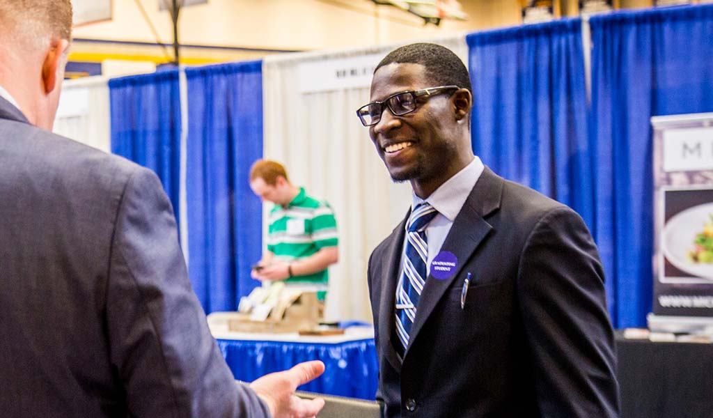 JWU student attending a career fair