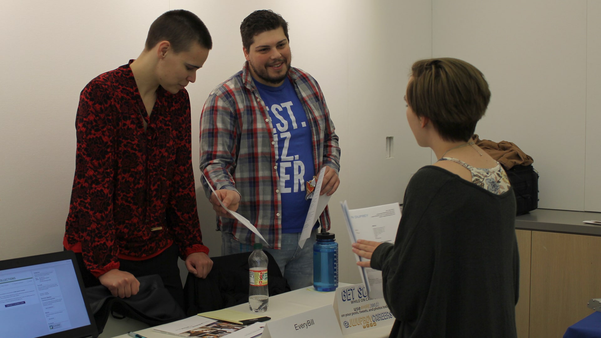 Students talk with employers at Technology Career Fair.