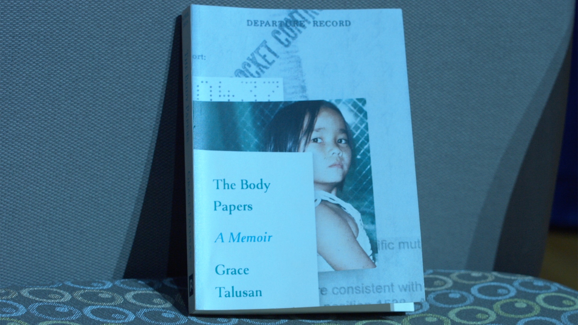 Grace Talusan's photo on the cover of her book, “The Body Papers” 