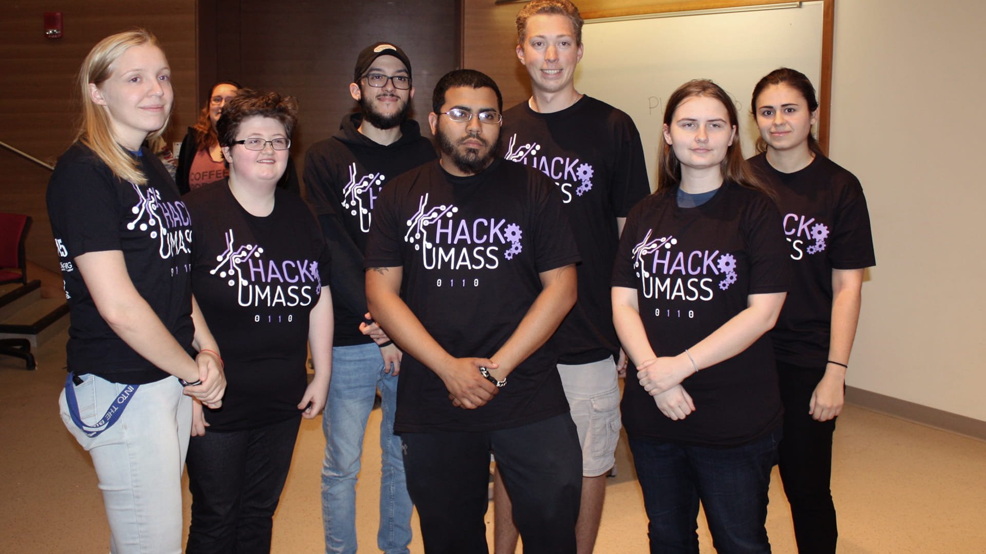 JWU students pose for a photo during HackUMass VI at UMass Amherst.
