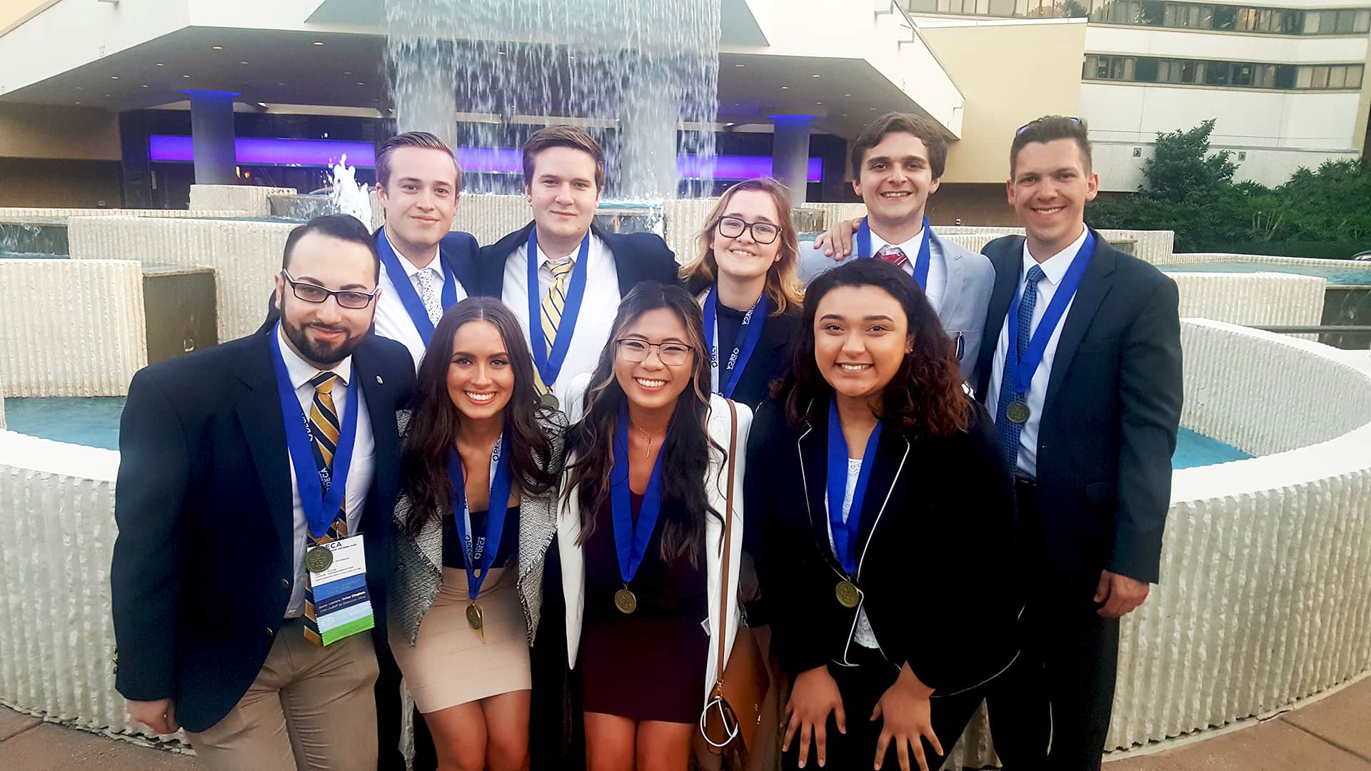 2019 DECA finalists in front of fountain
