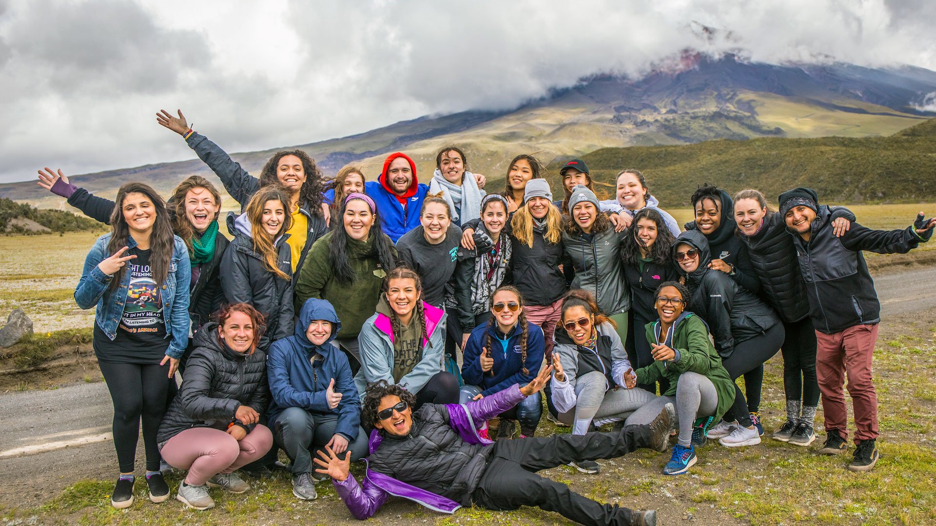 FAM Tour group in front of the famous, live Cotopaxi volcano