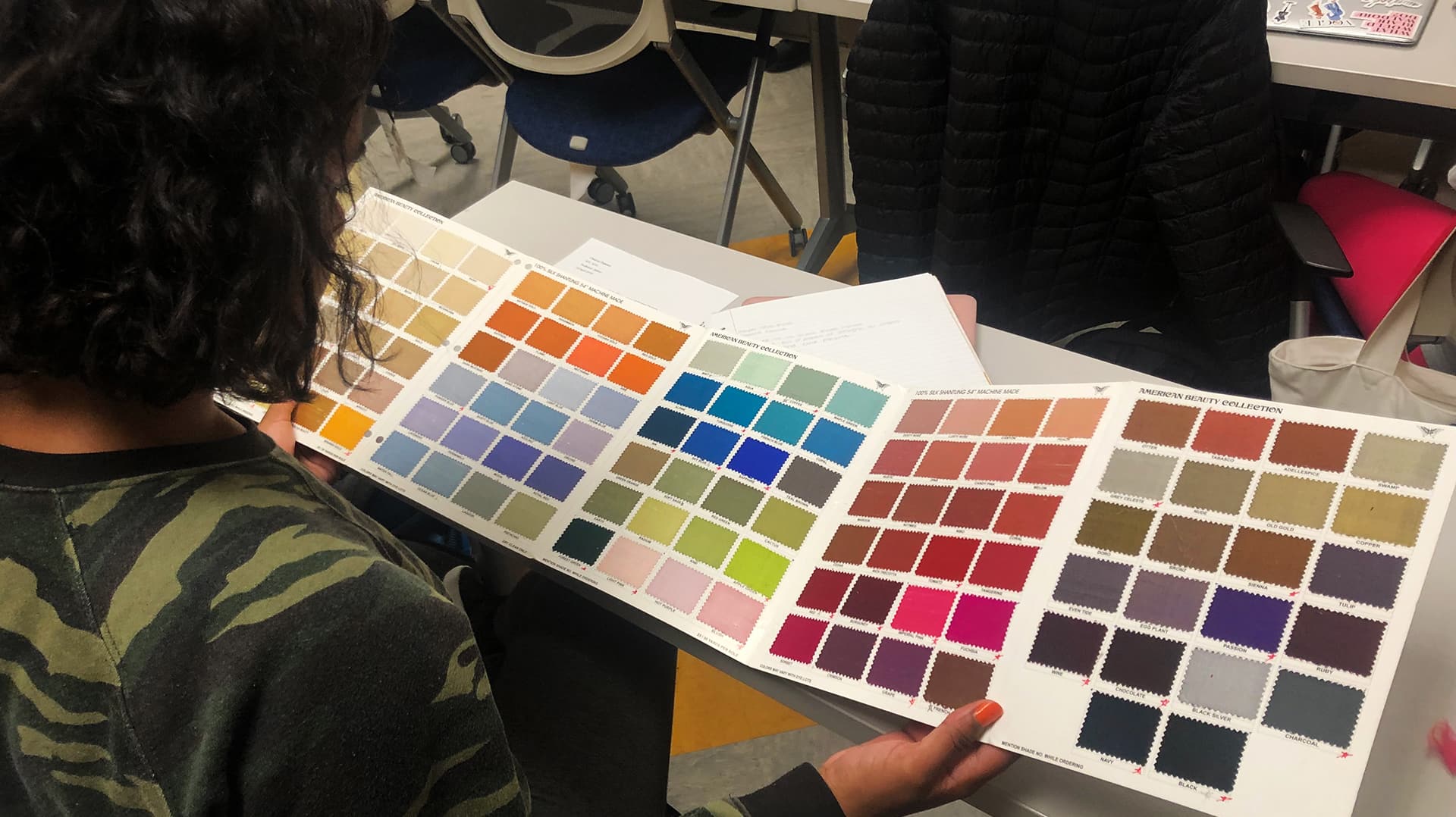 Students looking at color swatches.