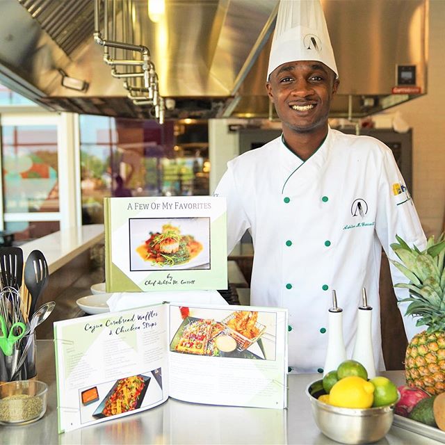 Chef Ashten Garrett with his 2020 cookbook, “A Few of My Favorites.”