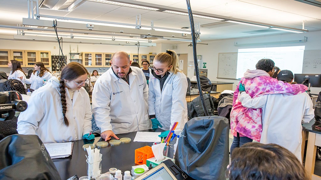 Students and faculty in a lab