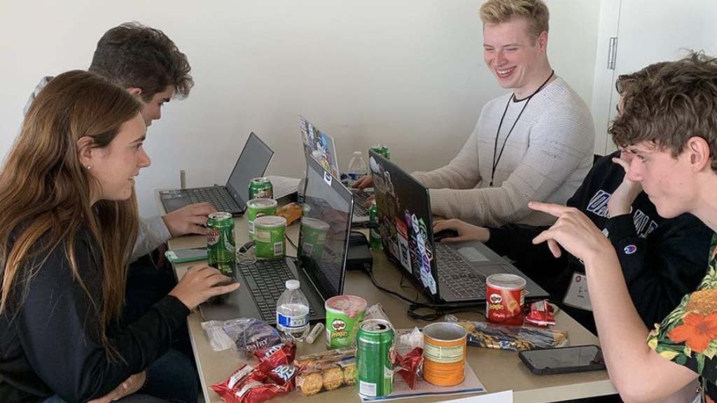HackJWU team members at a hackathon in 2019.
