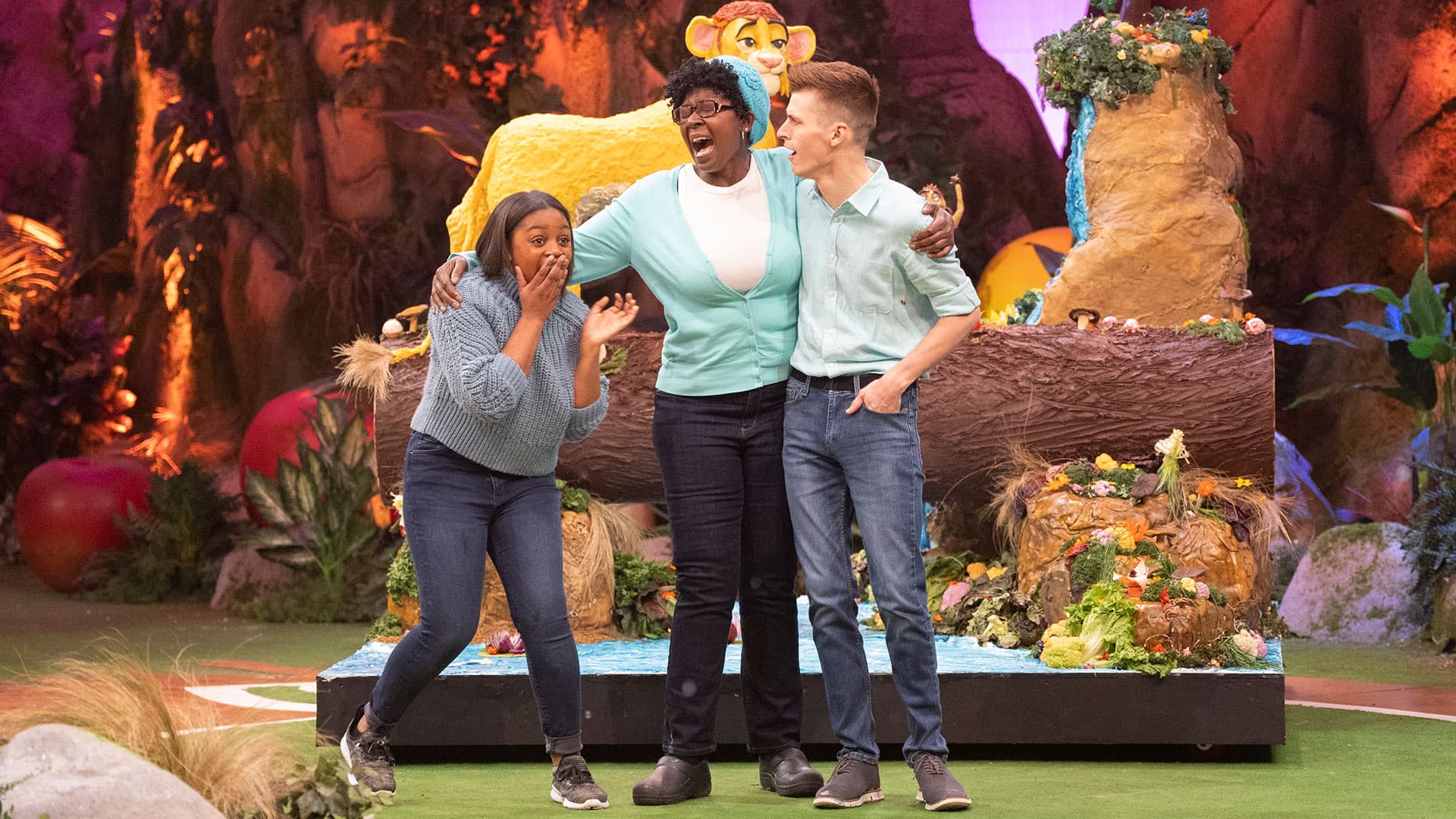 London, Schellie and Austin react to learning they have won the “Lion King: Queen of the Jungle” contest on Disney’s “Foodtastic”