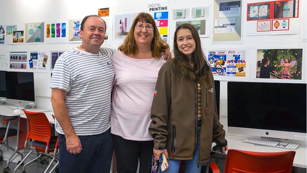 Student Julia Shiels and family in graphic design building
