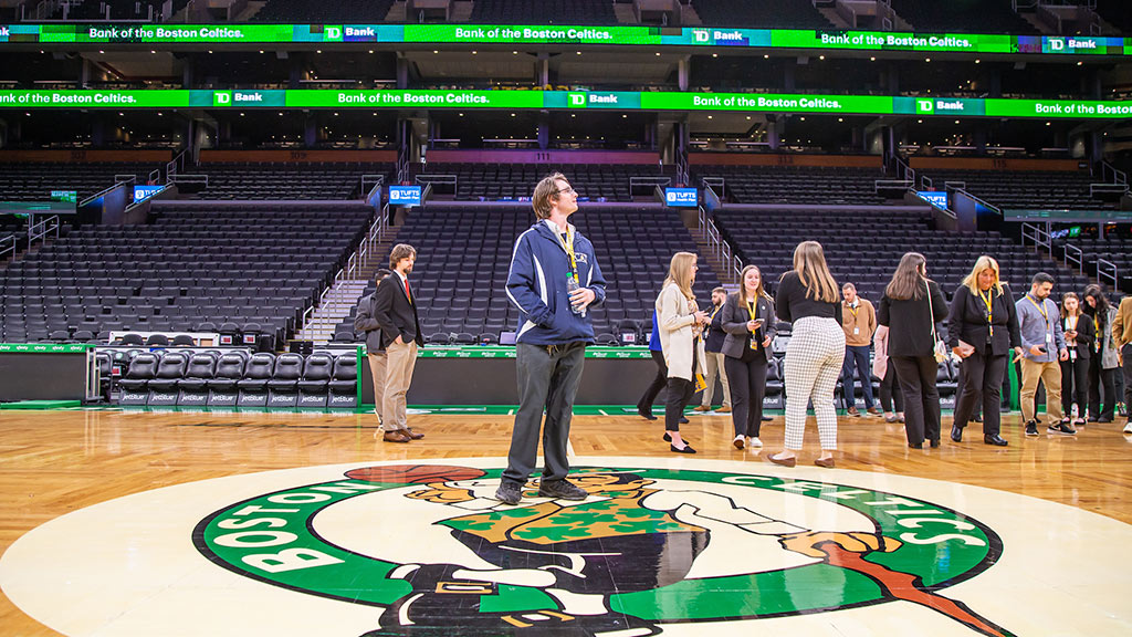 Students on the Boston Celtics court at TD Garden