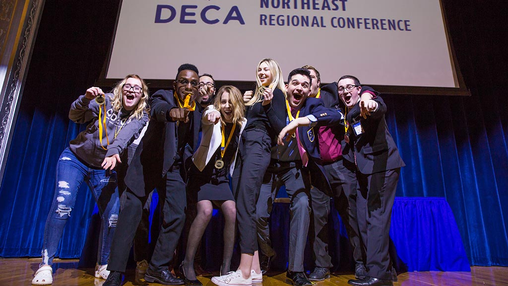JWU students celebrate after winning the 2019 DECA Northeast Regional Conference