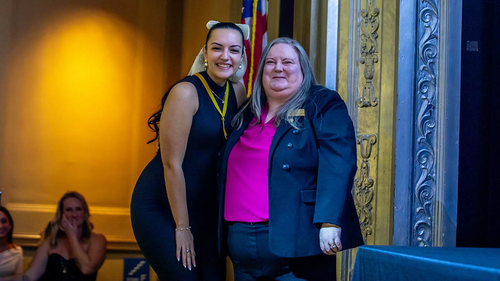 Kelsey Quinlan (left) with Kiley Medeiros (right), director of the nursing program at JWU Providence, at the Nursing Pining Ceremony.