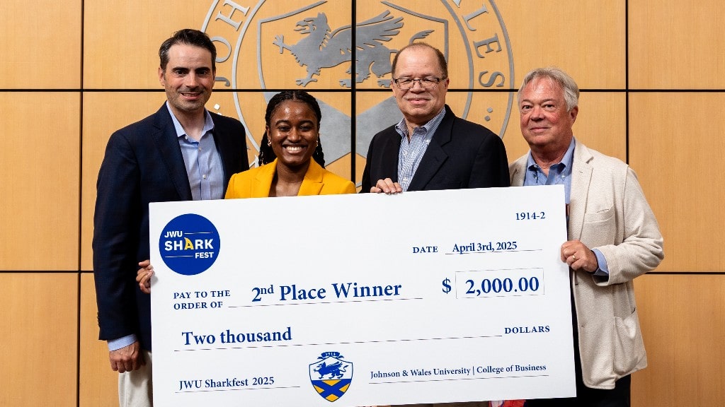 Sierra Blair ’25 with judges Manny Rodrigues, Spencer Disher, Joe Marley