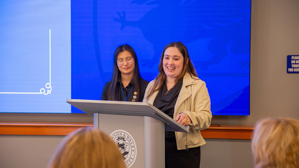 Stella Lee at a podium