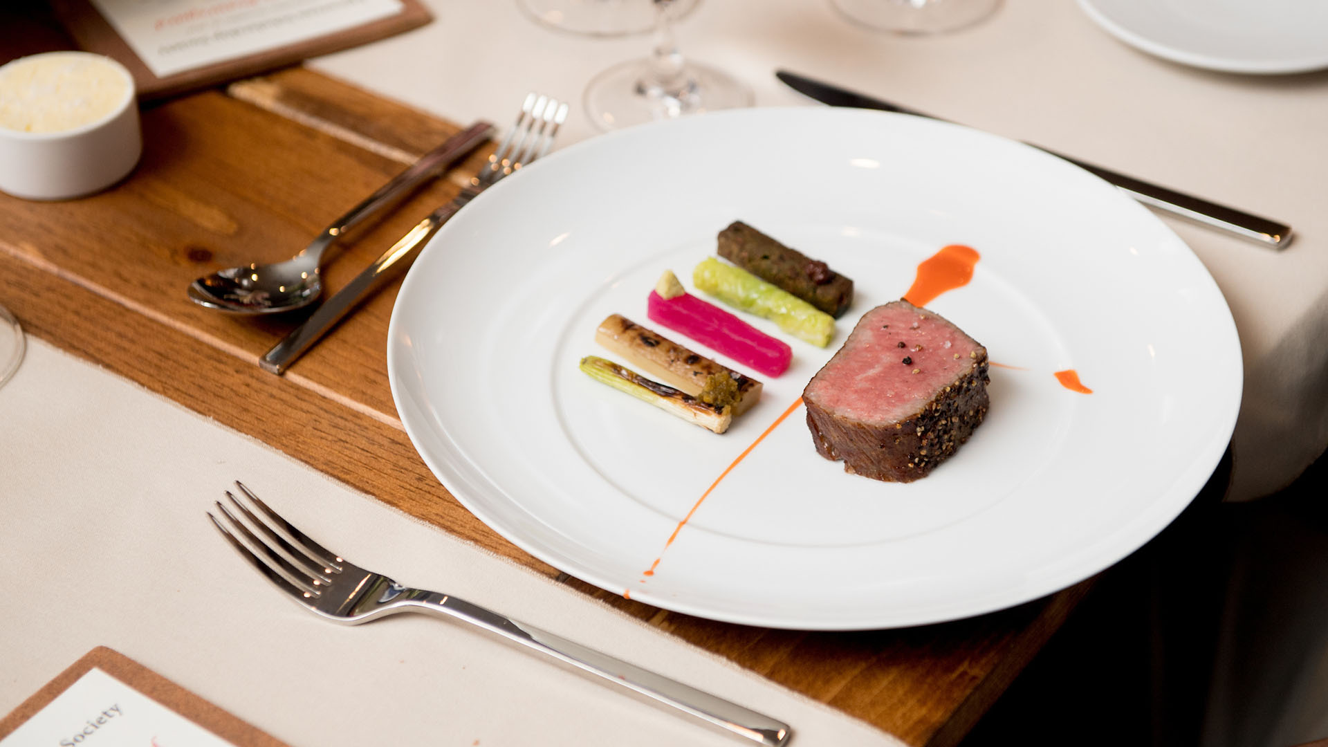 A plate with steak and vegetables