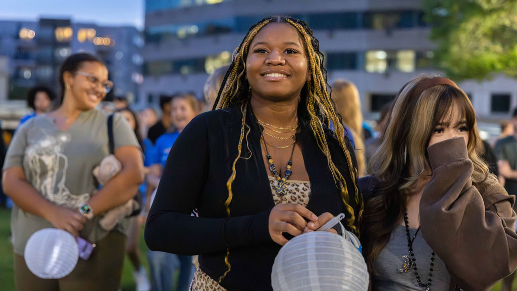 Students celebrating the start of the Fall 2025 semester at Ignite the Night at the Charlotte Campus