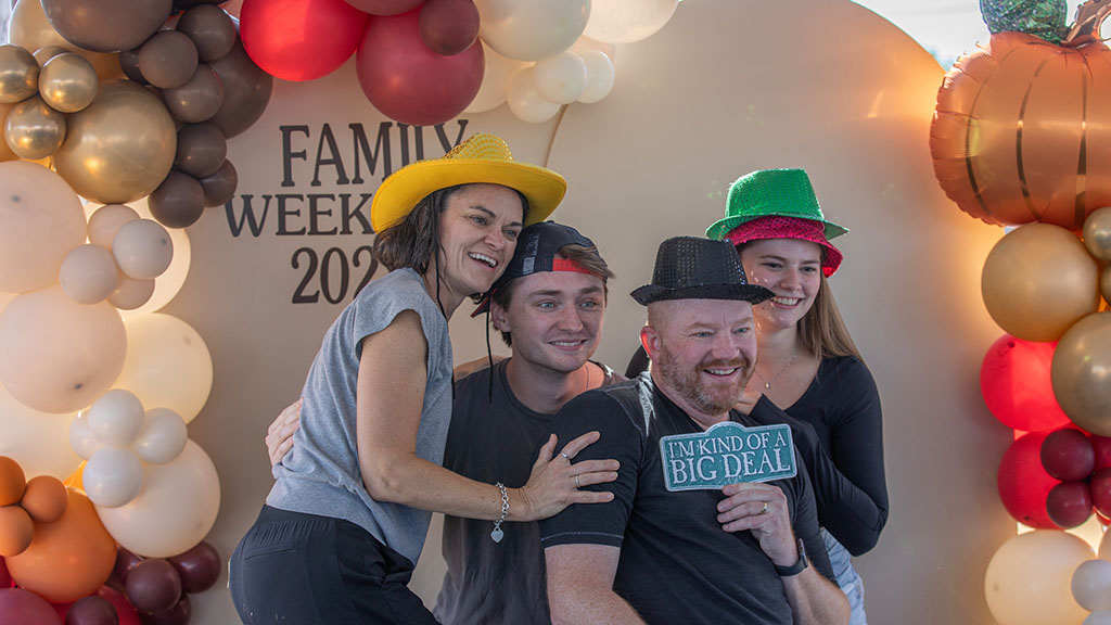 Family posing for photo