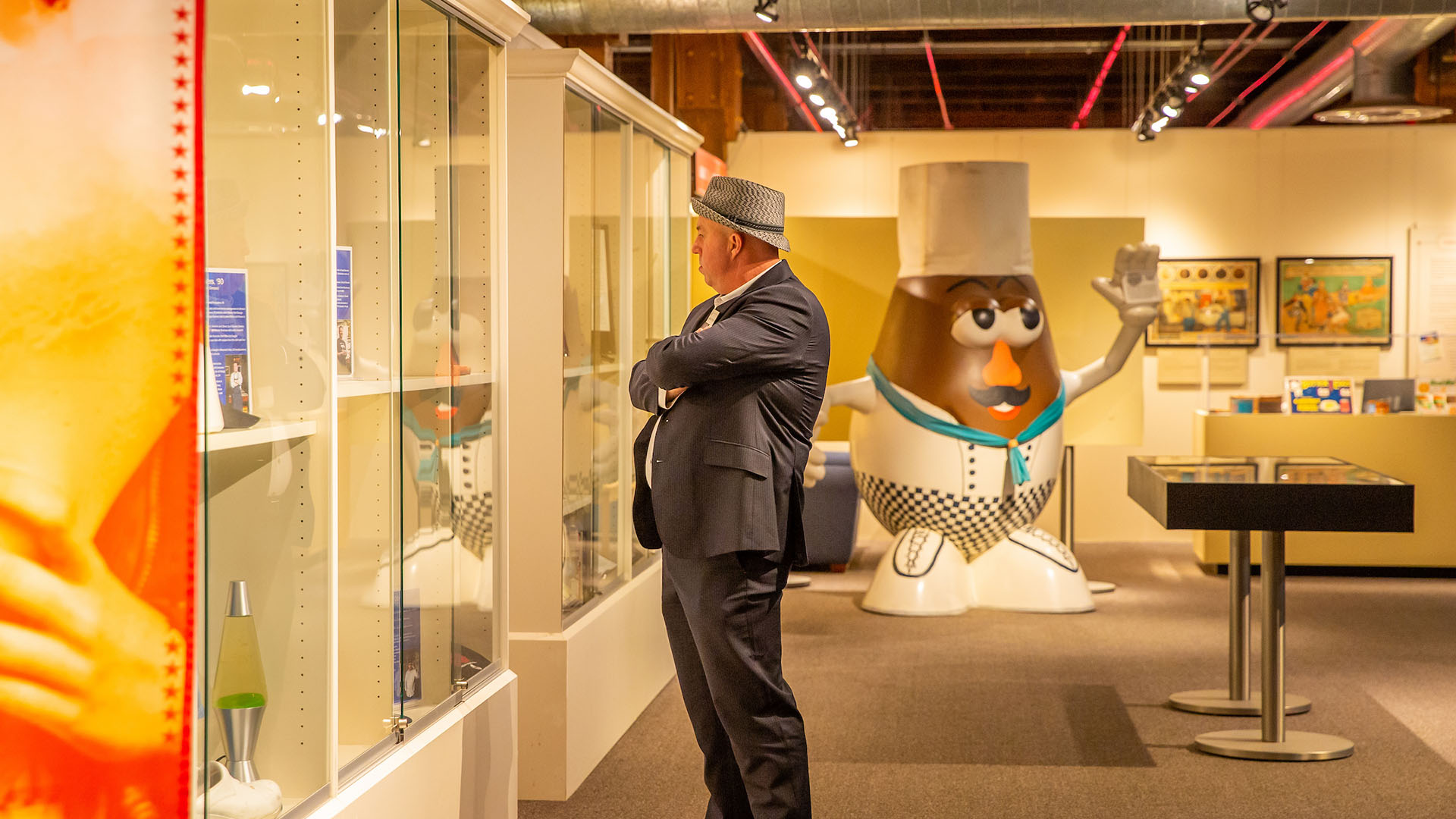 A man looking at a museum exhibit