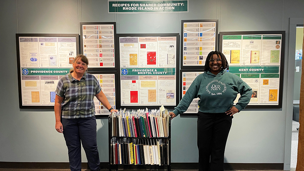Erin Williams and Jelly Williams with the collection of cookbooks