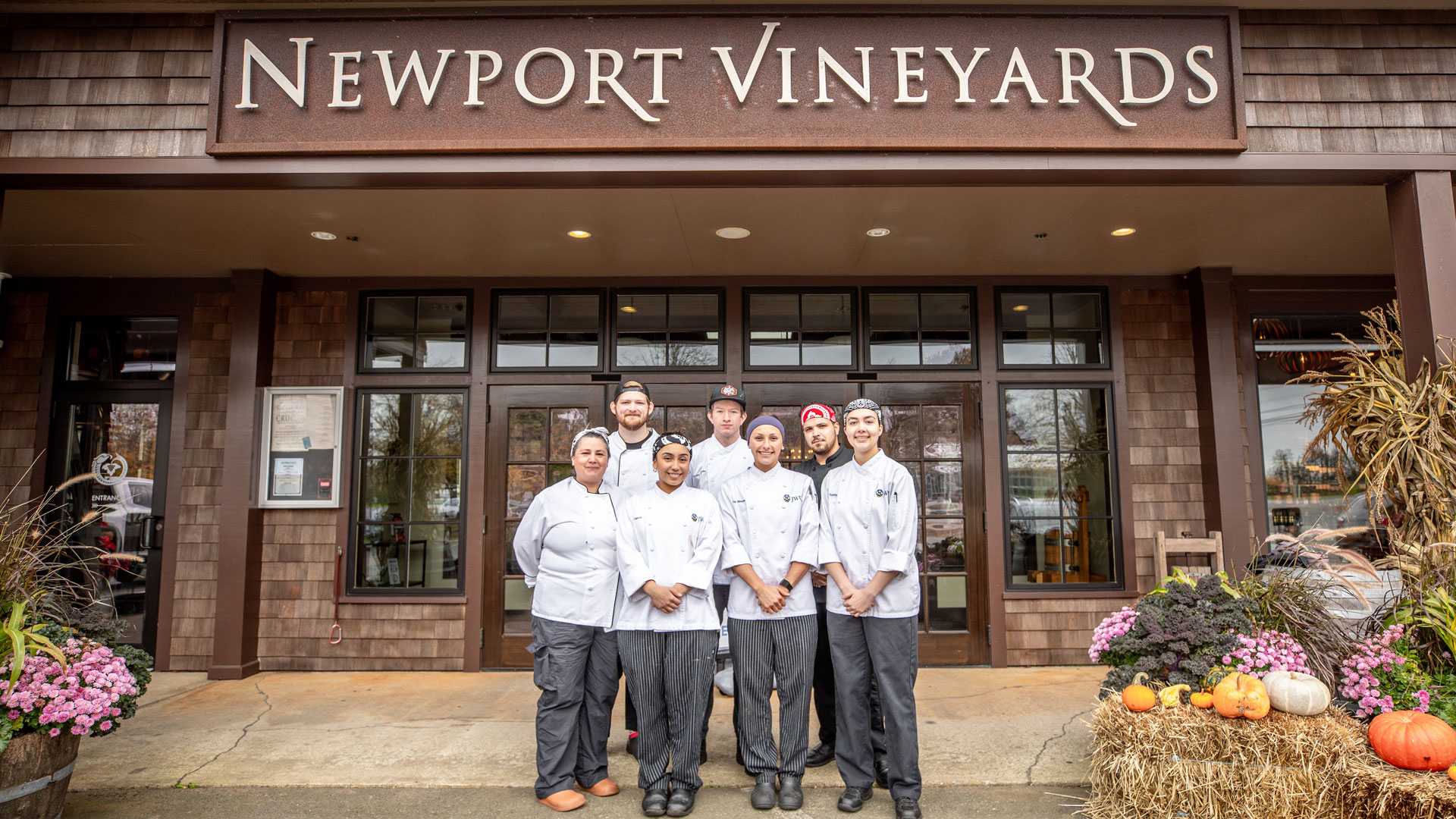 JWU interns and alumni outisde of Newport Vineyards