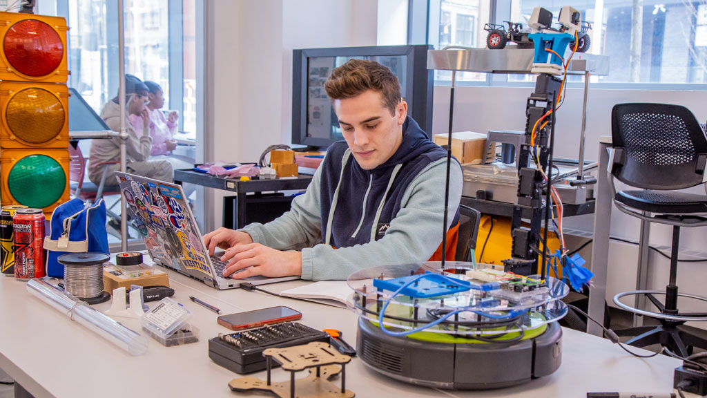 Student working on computer science project.