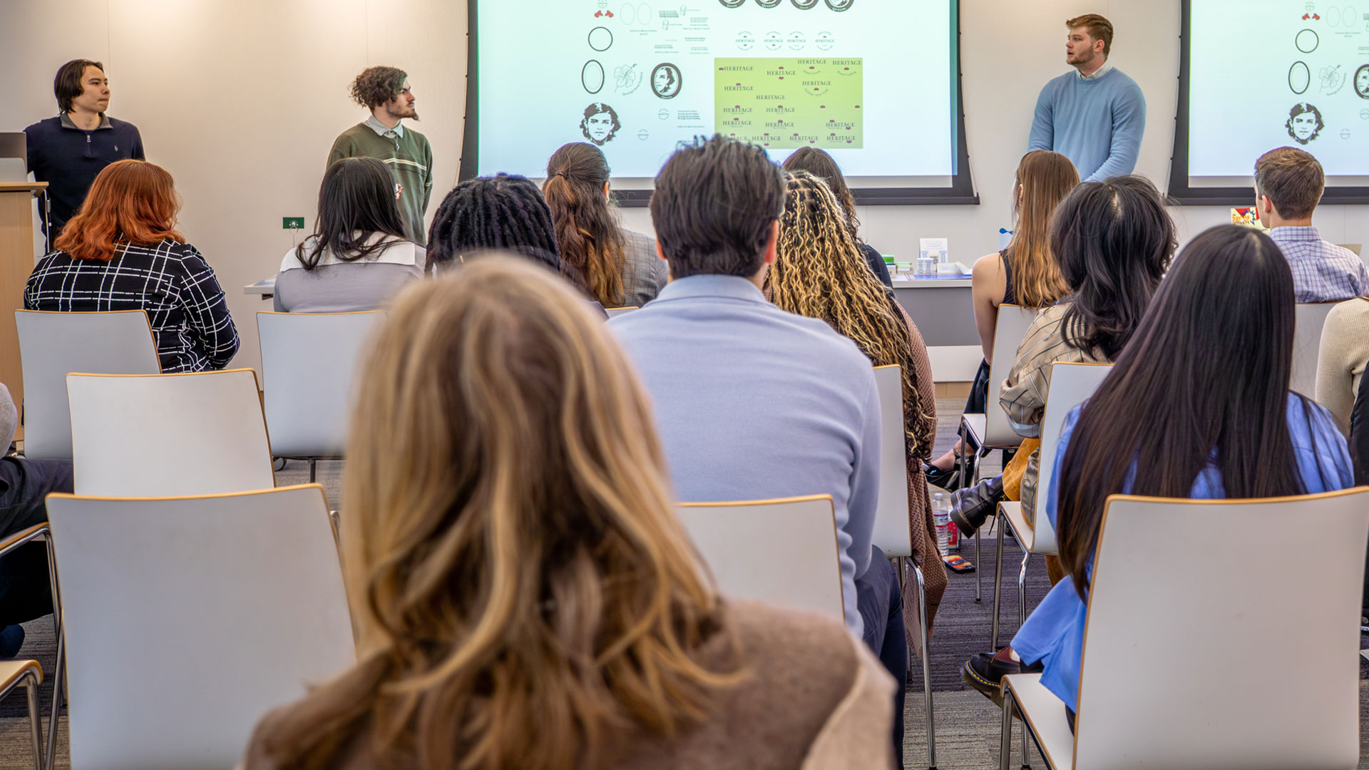 Design students present their brand refresh to Heritage Bread Pudding owners, faculty and students