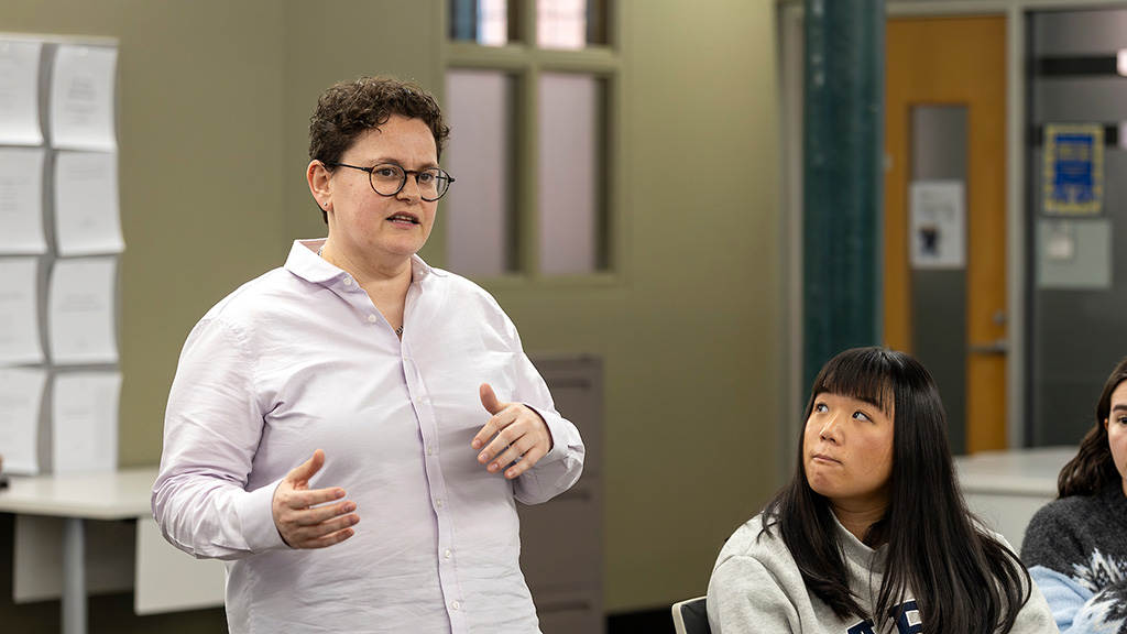 Professor Samantha Rosenthal speaks to some seated students