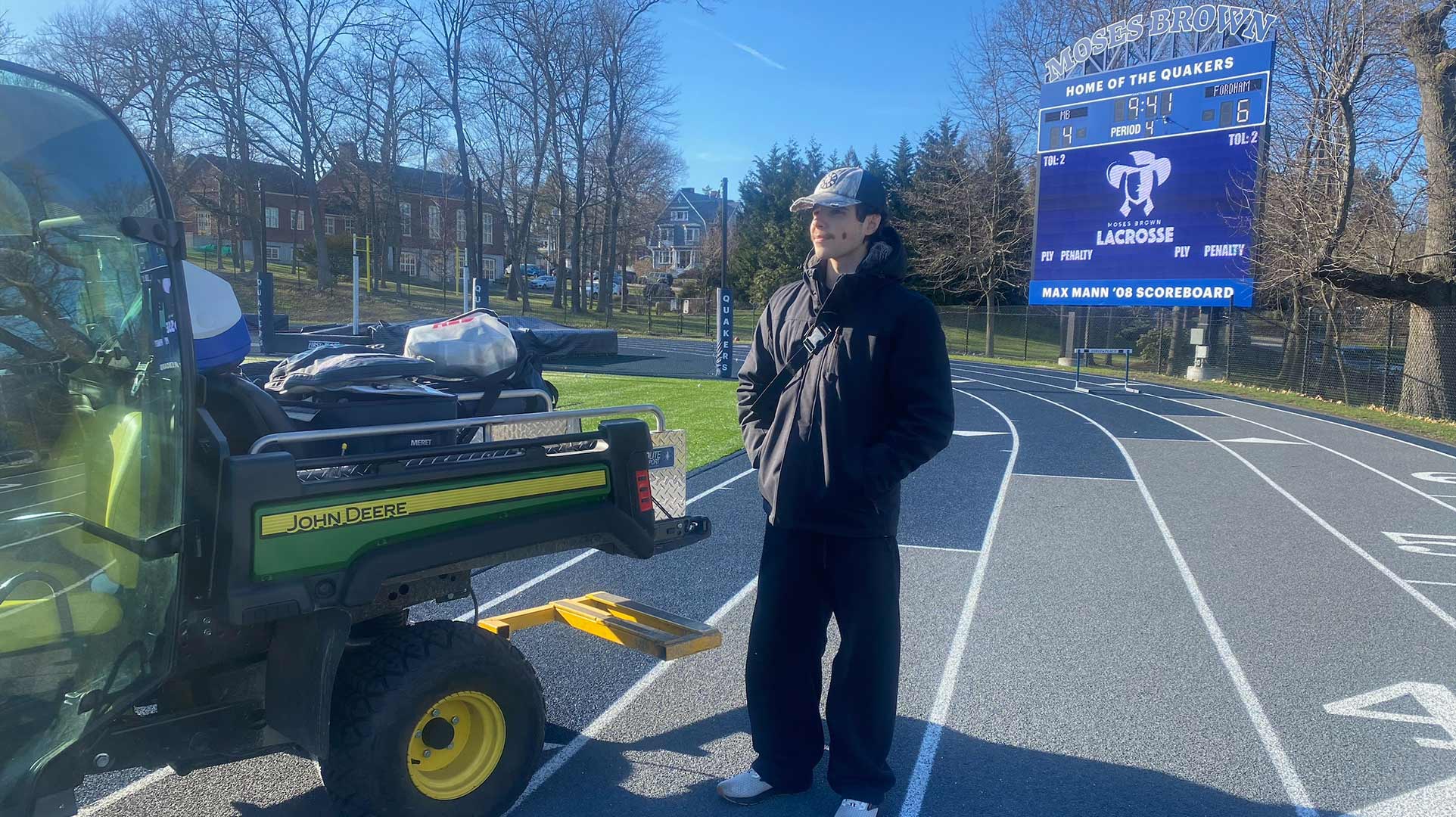 a photo of Maxim Allor '26 on the grounds of Moses Brown School