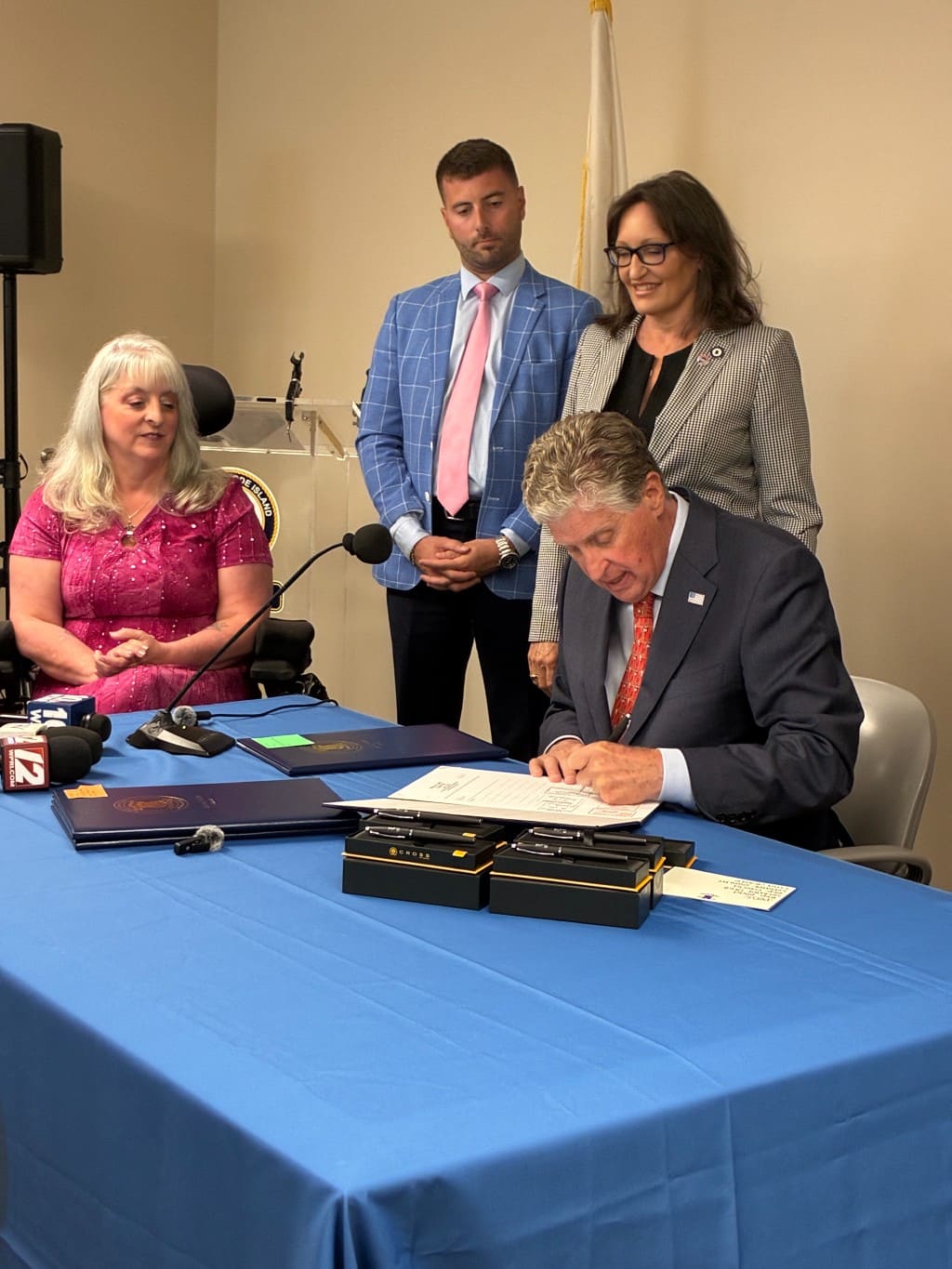 Gov. Dan McKee signs legislation authorizing two new disability access license plates in RI