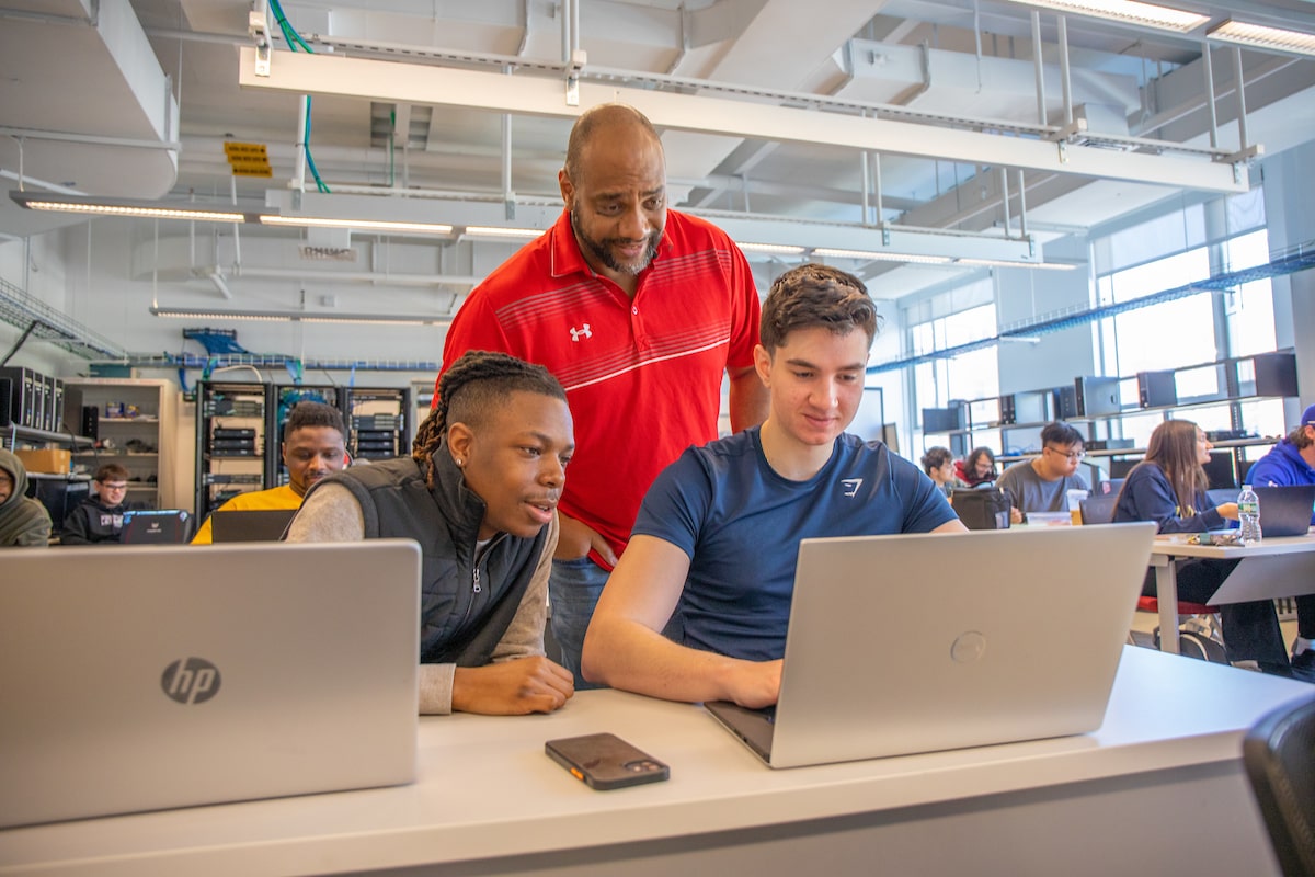 Students using computer in JWU's Cybersecurity Lab